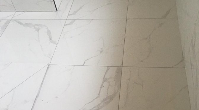 Removing old tiles & doing Renovations